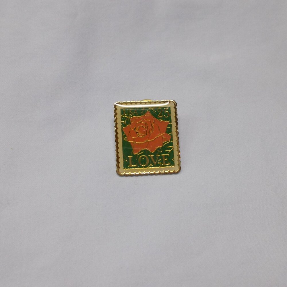 LOVE stamp pin with pink rose, USA and 25 on front of pin